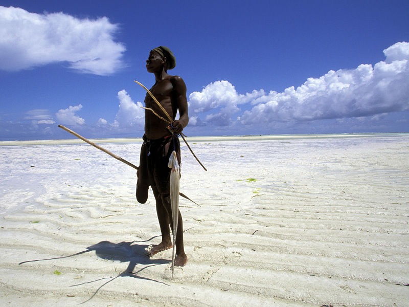 Fisherman on the Beach at Low Tide, Zanzibar, Tanzania